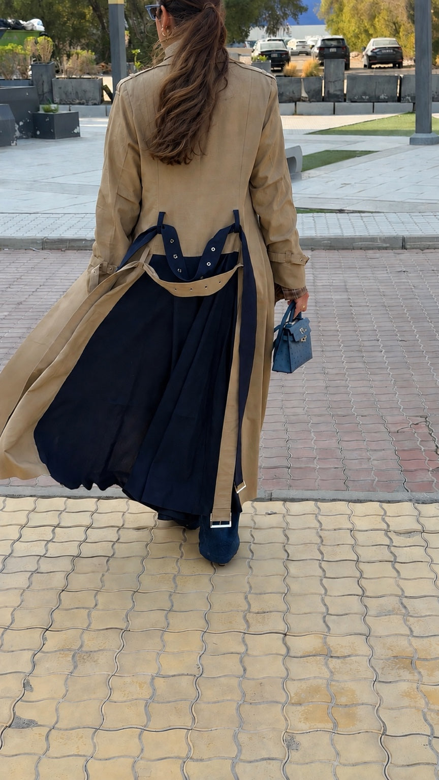 Beige linen trench coat with navy back panel and plaid details